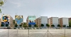 Empiezan los trabajos del primer mural del proyecto ideado por la artista Alexandra del Bene en la sevillana calle Tarfia